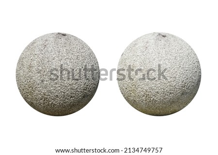 Two big rounded granite stone rocks are isolated on white background. spherical granite stone rocks. Stone for outdoor garden decoration.
