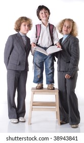 Two Big Sister In School Uniform And Little Boy