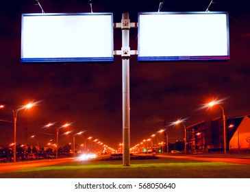 Two Big White Billboards On Lighting Street At Night