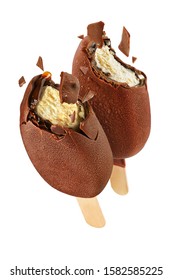 Two bitten vanilla ice cream popsicles with chocolate coating isolated on white background