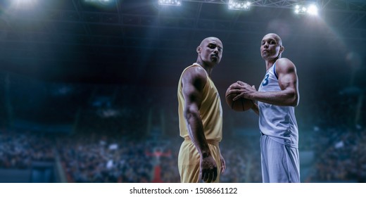 Two Black Basketball Players On Big Professional Arena Before The Game. Two Teams. Players Collided Face To Face. Player Holds A Ball.