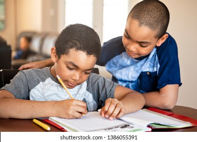 Two Black Brother Child Doing Homework At Home