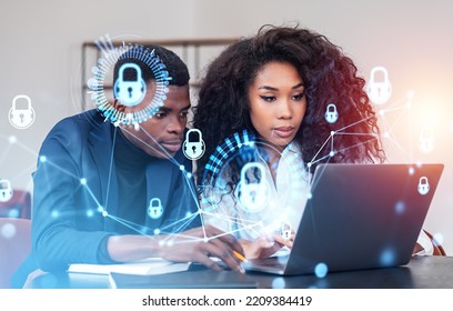 Two Black Businessman And Businesswoman Working Together, Using, Laptop On Desk. Glowing Padlock Icon With Circuit Hud. Cybersecurity And Data Protection. Concept Of Privacy