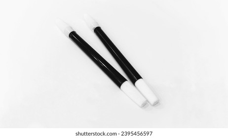 two black markers for drawing or writing boldly - Shutterstock ID 2395456597