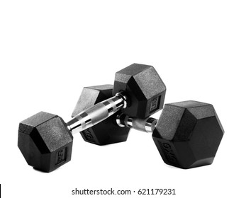 Two black metal dumbbells on isolated background - Shutterstock ID 621179231