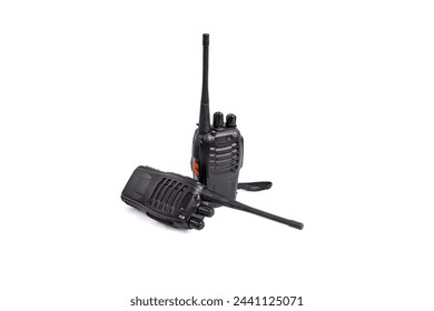 Two black plastic walkie talkies isolated on white background