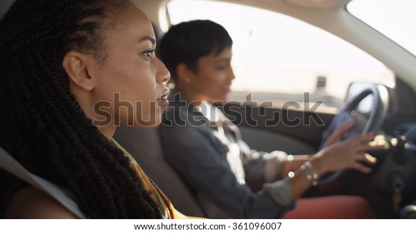 Beautiful woman friends group of joggers running outdoors in