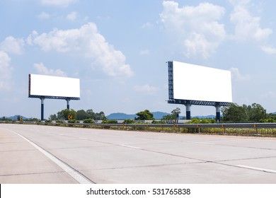 Two Blank Billboard On The Highway With Blue Sky