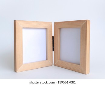 Two Blank Picture Fame With Old Black Hinge, Bi-fold Wooden Photo Frame On White Background With Clipping Path.