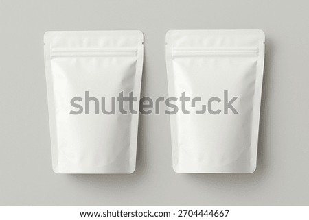 two blank white plastic packaging pouch mockup