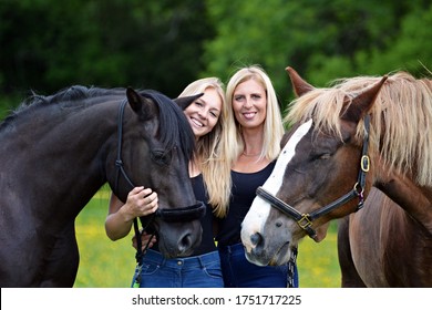 Two blond women with a brown horse