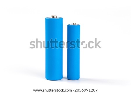 two blue Different types of batteries isolated on white background
