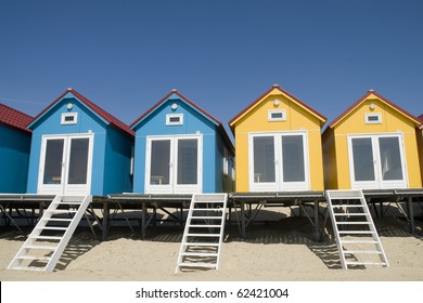 Two Blue And Two Yellow Beach-houses