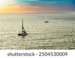 Two boats sailing in São Marcos Bay in the north of the state of Maranhão, Brazil