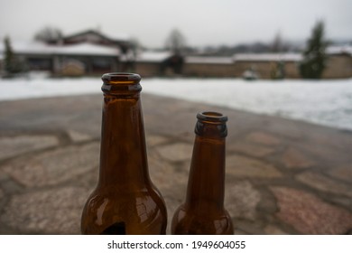 Two Bottles Of Beer Outside