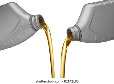 Two Bottles Of Engine Oil Being Poured