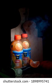 Two Bottles Of Minute Maid Pulpy With The Addition Of Fresh Oranges