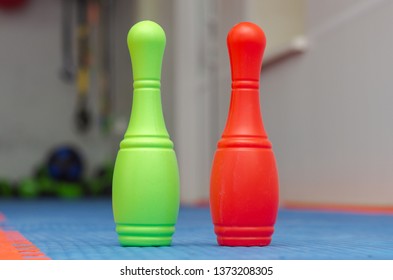 Two Bowling Pins. Green And Red.