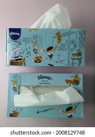 Two Boxes Of Tissues. Side And Top View. Lat Famous Artist Illustrations Featured On Special Edition Kleenex Tissue Boxes. White Soft Cotton Extract. Blue Box. Pink Background. Malaysia. July 2021