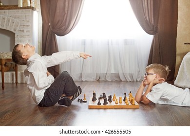 Two boy playing chess