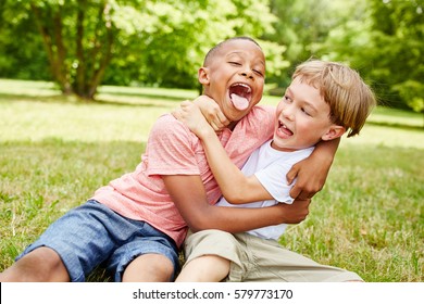 Two Boys Have Fun Park Wrestle Stock Photo 579773170 | Shutterstock