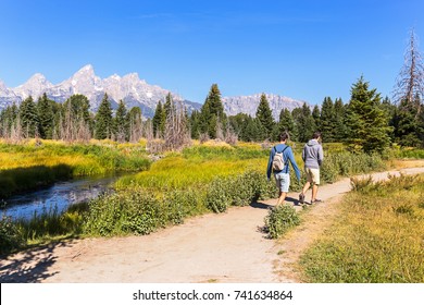 Two Boys Hiking In The Grand Teton National Park, Wyoming