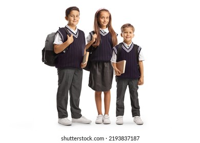 Two Boys And One Girl In School Uniforms Carrying Backpacks Isolated On White Background