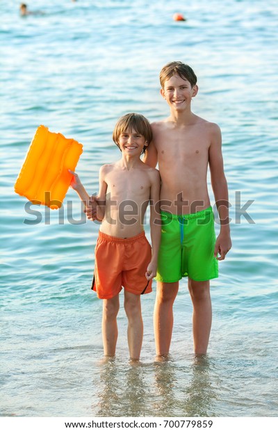 boys in trunks