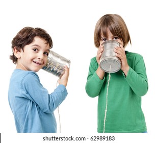Two boys talking on a tin can phone isolated on white