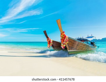 Two Bright Decorated Thai Longtail Boats At Long Beach (Had Yao Beach), Best Phi Phi Don Island Beach, Thailand, View To Phi Phi Lee Island Silhouette At Horizon