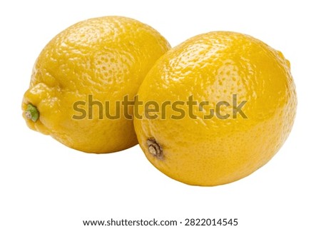 two bright yellow lemons placed side by side. Both lemons have a slightly textured, bumpy skin.