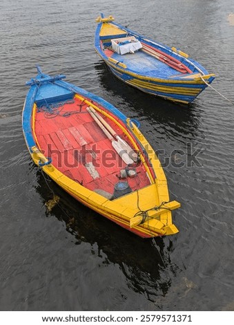Similar – Image, Stock Photo Yellow fishing boat moored in ocean turquoise water