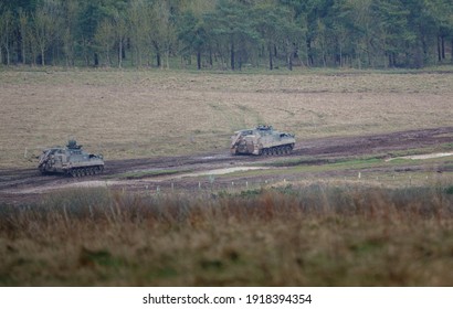 Two British Army Warrior Mechanized Repair Vehicle FV512 MRV On A Military Exercise, Salisbury Plain UK