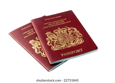 Two British Passports Isolated Over White Background