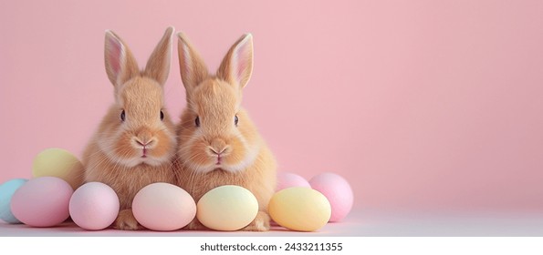 Two Bunnies with Easter Eggs on Pastel Background
Two adorable bunnies nestled among pastel Easter eggs on a pink background, Easter, bunnies, pastel eggs, Easter celebration - Powered by Shutterstock