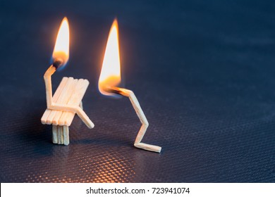 Two Burning Matches On Black Background. Husband Apologizing Wife. Man Asking Woman For Forgivness. Boyfriend Trying To Convince Girlfriend. Relationship Problem.