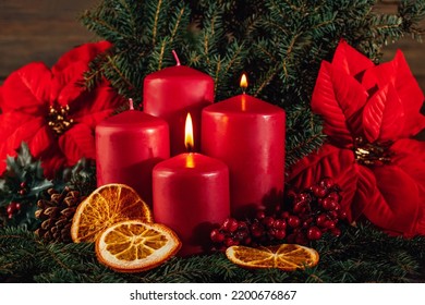 Two burning Red advent candles in advent wreath decoration on wooden dark background. tradition in time before Christmas. xmas lights with christmas fir deco background concept. Festive still life. - Powered by Shutterstock