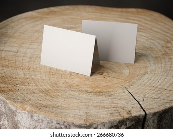 Two business cards on the stump