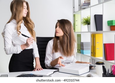 Two Business Ladies Are Having An Argument At Work. The Subordinate Is Not Impressed By Her Boss's Decision. Concept Of Disagreement