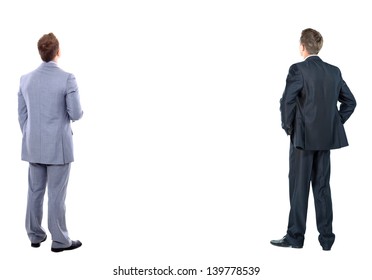 two business mans from the back - looking at something over a white background