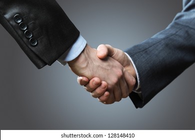 Two Business Men Shaking Hands, Close Up