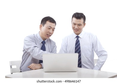 Two business men who use computer - Shutterstock ID 498646147
