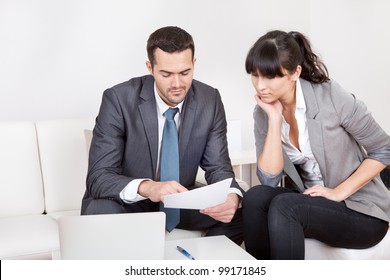 Two Business People Sitting Couch Discussing Stock Photo 99171845 ...