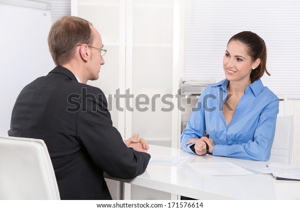 Two Business People Talking Together Desk Stock Photo (Edit Now) 171576614