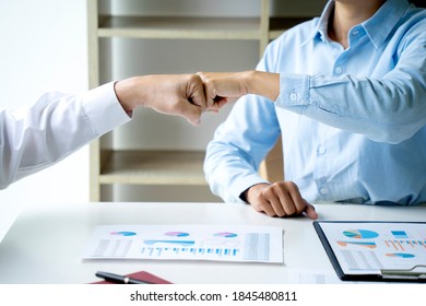 two business people use hand to fist bump for succes teamwork coporate Partner Business Trust Teamwork Partnership