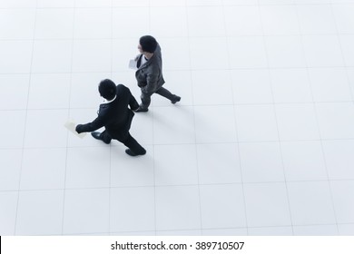 Two Business People Walking, High Angle