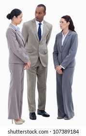 Two Business People Watching Their Copworker Against White Background