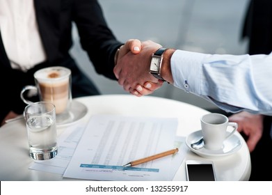 Two business tycoons meet over a coffee and closed long-term deal. - Shutterstock ID 132555917