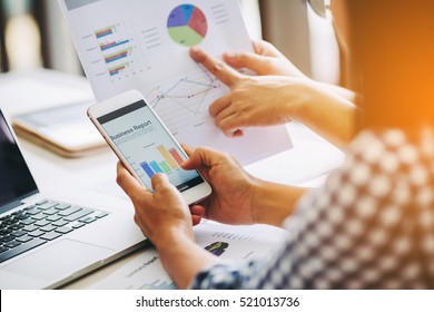 Two Business Woman Investment Consultant Analyzing Company Annual Financial Report Balance Sheet Statement Working With Documents Graphs. Concept Picture Of Economy, Market, Office,money And Tax.