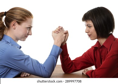 Two Business Women Arm Wrestling Each Other 